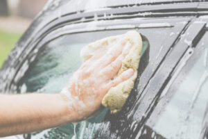 IRS Wash Rule ; image: sponge soaking a vehicle
