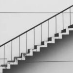 better financial future ; image: shadow of staircase