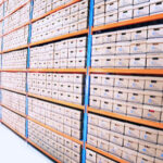 OPM Retirement Services ; image: warehouse filled with archive boxes
