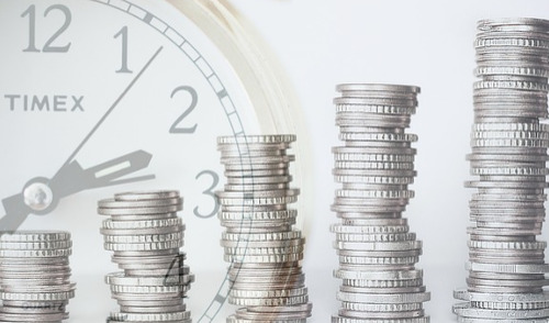 MRA+10 retirement under FERS ; image: a stack of coins in front of a clock