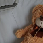 when to purchase long-term care insurance ; image: teddy bear on hospital bed