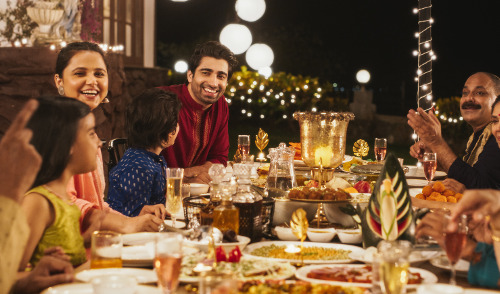 Difference between a contingent and a successor beneficiary ; image: extended family having a feast