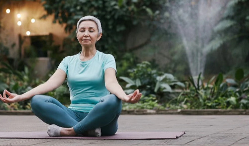 Health Savings Accounts ; image: woman meditating