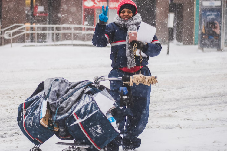New Health Insurance Program for USPS ; Image: Mail Carrier in the Snow