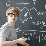 Roth TSP ; image: man at chalkboard doing math