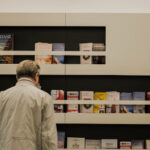 Types of Health Plans ; image: man at the pharmacy