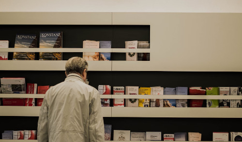 Types of Health Plans ; image: man at the pharmacy