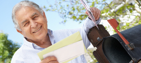 Federal Employee News - special enrollment period for medicare b - image: happy retiree checking mailbox