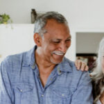 Enhanced FERS Retirement Annuity - podcast image: happy older couple in kitchen