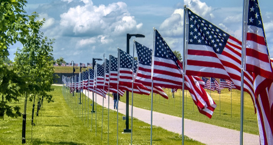 Best US Agencies to Work For ; image: American Flags outside an agency